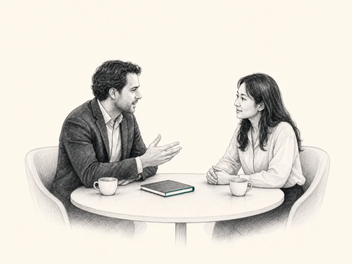 A talent acquisition professional and candidate in a focused interview